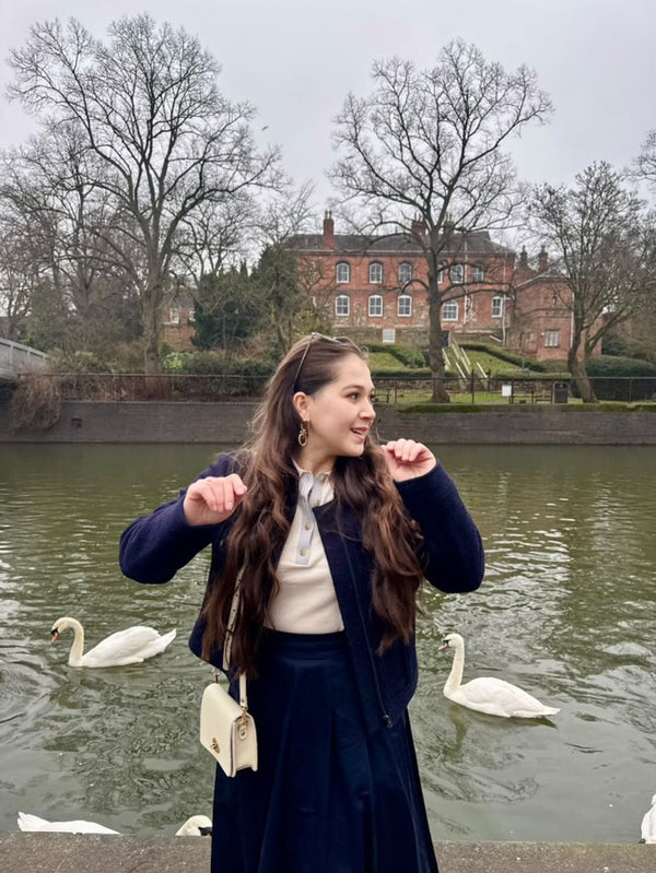 beautiful leda showing off her cream leather Luna bag on her shoulder