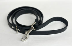 Black leather dog lead with nickel clip.