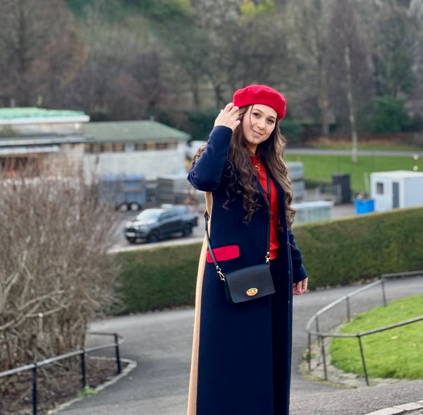 Beautiful lady wearing her Black leather Luna bag on her shoulder in Scotland 